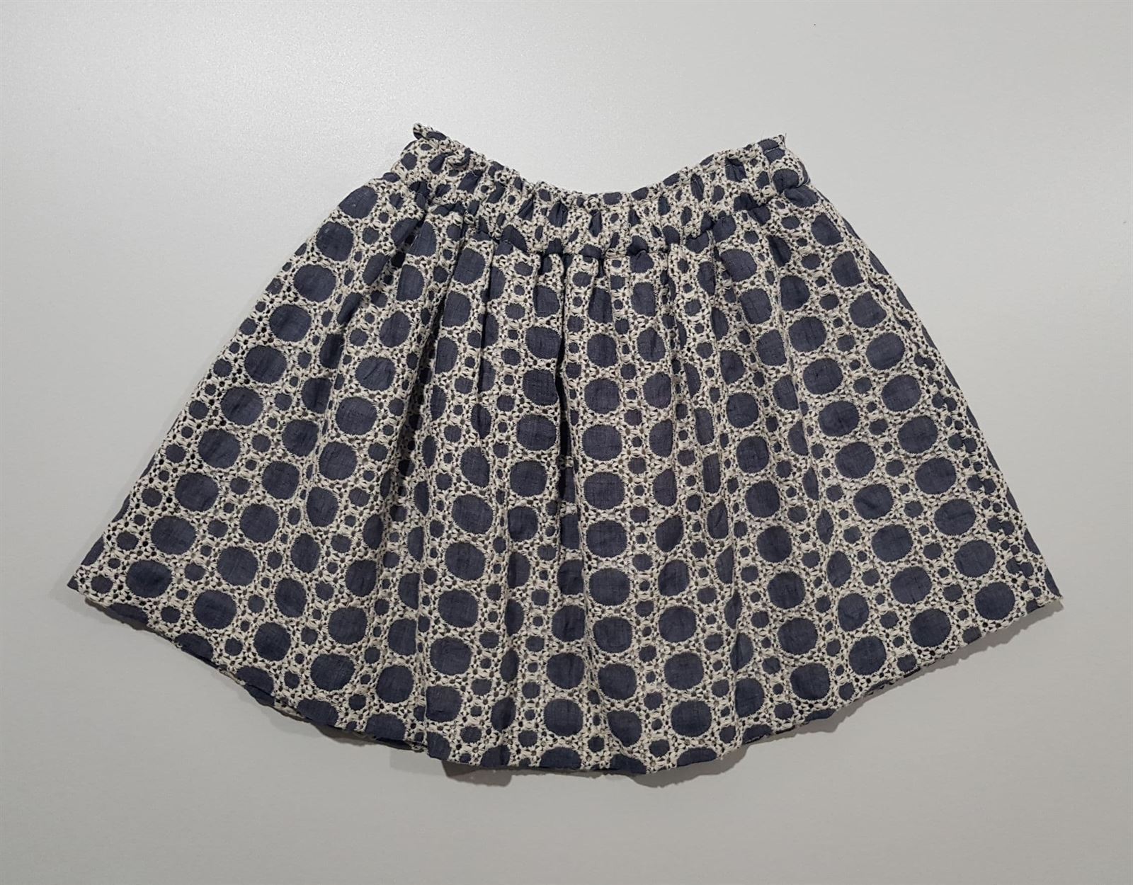 Falda corta circulos azules. - Imagen 1